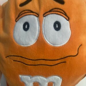 Mnms small orange backpack.  Official mnms